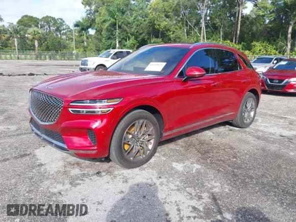 ✅ 2023 Genesis GV70 2.5T • VIN: KMUMADTB0PU136812 • Лот: 43545939. Опубликован ранее на IAAI с пробегом 26 721 миль. Бесплатный доступ к архиву аукционных продаж из США и подробный отчёт об истории автомобиля на DreamBid. Изображение 2.