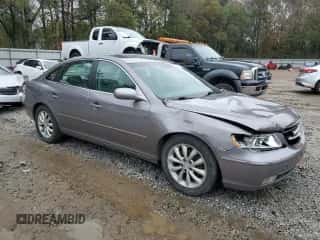 2006 Hyundai Azera SE z VIN KMHFC46F16A103916, wystawiony jako Copart lot #79886264 z przebiegiem 102 506 mil mil oraz Szkoda całkowita • Salvage title. Historia ofert i sprzedaży dostępna na DreamBid. Obrazek 4.