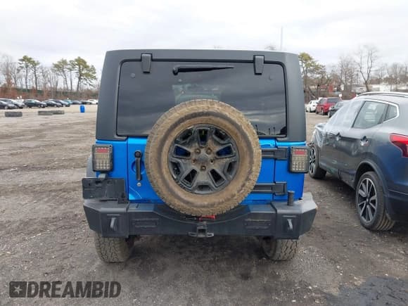 ✅ 2015 Jeep Wrangler Unlimited Sport • VIN: 1C4BJWDG4FL508785 • Lot: 41738598. Wystawiony na IAAI z przebiegiem 115 564 mil. Bezpłatny archiwum sprzedaży aukcyjnych z USA i szczegółowy raport historii pojazdu na DreamBid. Zdjęcie 16.