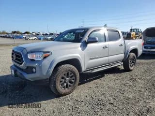 ✅ 2021 Toyota Tacoma SR • VIN: 3TMCZ5AN3MM407775 • Lot: 87019475. Listed on Copart with 51,270 mi. Free auction sales archive from the USA and detailed vehicle history report at DreamBid. Image 1.