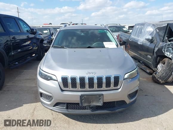 ✅ 2021 Jeep Cherokee Latitude • VIN: 1C4PJLCB2MD121170 • Lot: 43168641. Listed on IAAI with 61,514 mi. Free auction sales archive from the USA and detailed vehicle history report at DreamBid. Image 12.