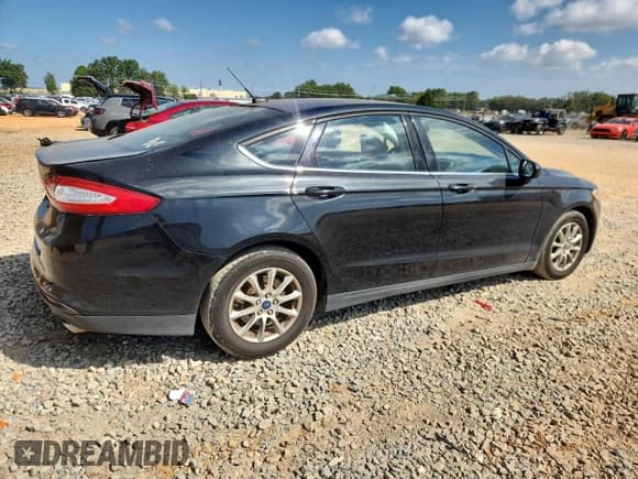 ✅ 2015 Ford Fusion S • VIN: 3FA6P0G77FR149061 • Lot: 82113165. Wystawiony na Copart z przebiegiem 149 025 mil. Bezpłatny archiwum sprzedaży aukcyjnych z USA i szczegółowy raport historii pojazdu na DreamBid. Zdjęcie 3.