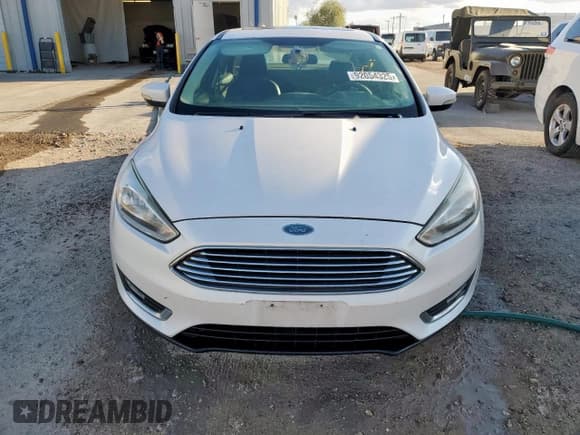 ✅ 2018 Ford Focus Titanium • VIN: 1FADP3J29JL289691 • Лот: 92054325. Опубликован ранее на Copart с пробегом 211 175 миль. Бесплатный доступ к архиву аукционных продаж из США и подробный отчёт об истории автомобиля на DreamBid. Изображение 5.