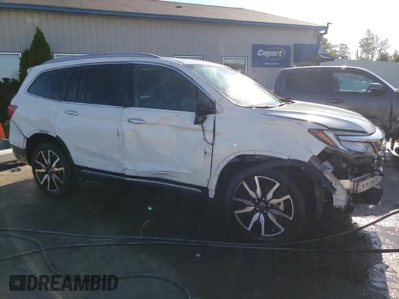 ✅ 2019 Honda Pilot Touring 7-Passenger • VIN: 5FNYF5H6XKB037214 • Lot: 71588585. Wystawiony na Copart z przebiegiem 24 268 mil. Bezpłatny archiwum sprzedaży aukcyjnych z USA i szczegółowy raport historii pojazdu na DreamBid. Zdjęcie 4.