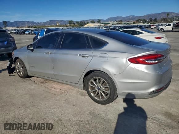 ✅ 2017 Ford Fusion Hybrid SE • VIN: 3FA6P0LU3HR381106 • Lot: 94952035. Listed on Copart with 165,568 mi. Free auction sales archive from the USA and detailed vehicle history report at DreamBid. Image 2.