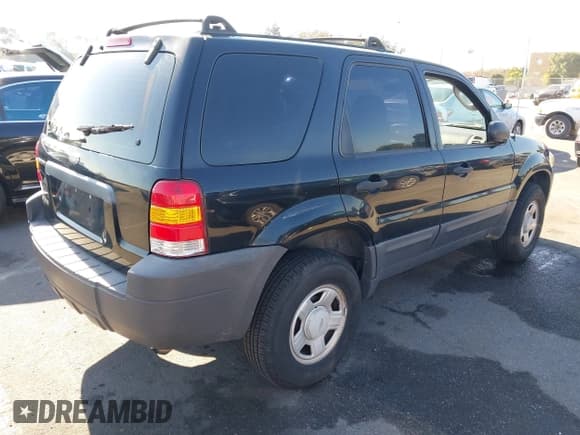 ✅ 2006 Ford Escape XLS • VIN: 1FMYU02Z76KB33799 • Lot: 43920217. Listed on IAAI with 171,864 mi. Free auction sales archive from the USA and detailed vehicle history report at DreamBid. Image 4.