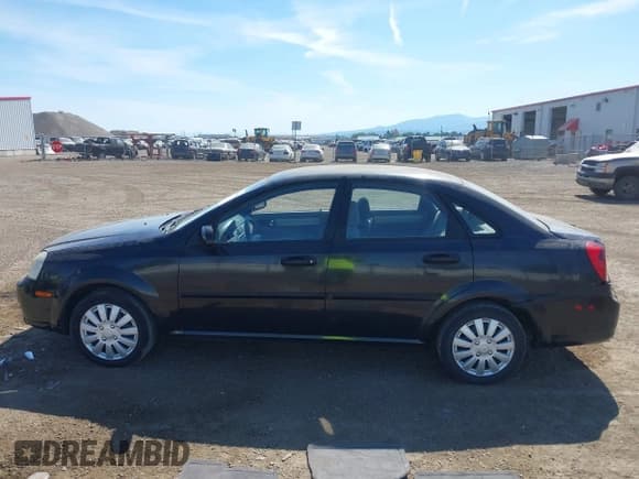 ✅ 2008 Suzuki Forenza • VIN: KL5JD56Z88K931136 • Лот: 42639104. Опубликован ранее на IAAI с пробегом 88 781 миль. Бесплатный доступ к архиву аукционных продаж из США и подробный отчёт об истории автомобиля на DreamBid. Изображение 14.