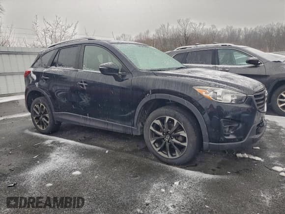 ✅ 2016 Mazda CX-5 Grand Touring • VIN: JM3KE4DY9G0886287 • Lot: 96258785. Wystawiony na Copart z przebiegiem 136 186 mil. Bezpłatny archiwum sprzedaży aukcyjnych z USA i szczegółowy raport historii pojazdu na DreamBid. Zdjęcie 4.