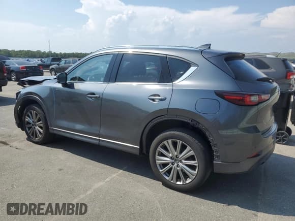 ✅ 2022 Mazda CX-5 Signature • VIN: JM3KFBXY0N0600644 • Лот: 65390865. Опубликован ранее на Copart с пробегом 39 783 миль. Бесплатный доступ к архиву аукционных продаж из США и подробный отчёт об истории автомобиля на DreamBid. Изображение 2.