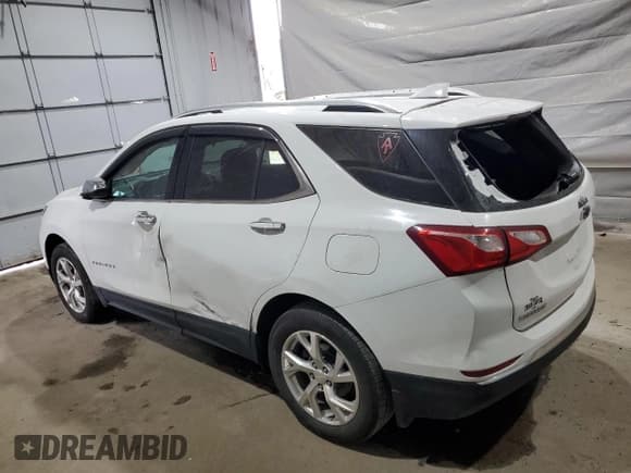 ✅ 2020 Chevrolet Equinox Premier • VIN: 3GNAXXEV2LS512716 • Лот: 69396435. Опубликован ранее на Copart с пробегом 112 182 миль. Бесплатный доступ к архиву аукционных продаж из США и подробный отчёт об истории автомобиля на DreamBid. Изображение 2.
