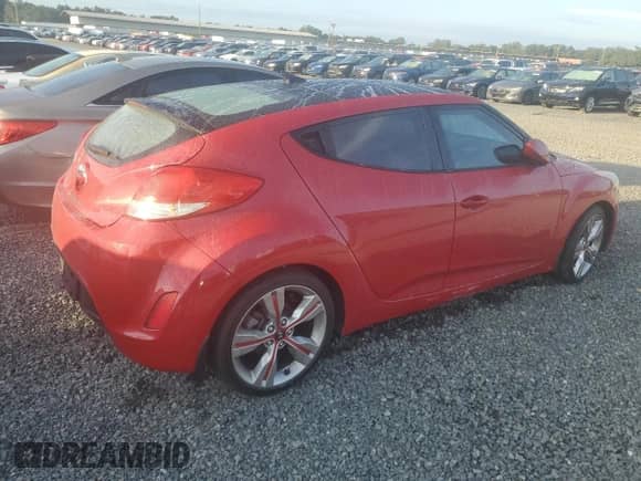 2013 Hyundai Veloster w/Black Int z VIN KMHTC6AD1DU119193, wystawiony jako Copart lot #73733224 z przebiegiem Nie podano mil oraz Szkoda całkowita • Salvage title. Historia ofert i sprzedaży dostępna na DreamBid. Obrazek 3.