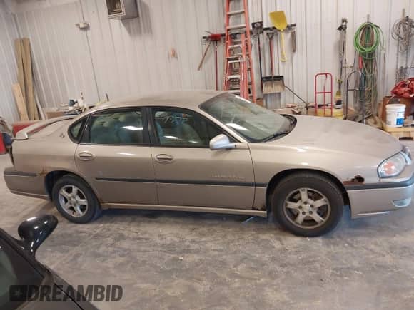 2003 Chevrolet Impala LS with VIN 2G1WH52K139357219, listed as a IAAI auction lot 43370372 with 213,221 mi miles and . Bid and sale history available at DreamBid. Image 13.