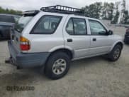 ✅ 1998 Isuzu Rodeo S • VIN: 4S2CM58W5W4353282 • Lot: 67462155. Listed on Copart with 268,537 mi. Free auction sales archive from the USA and detailed vehicle history report at DreamBid. Image 3.