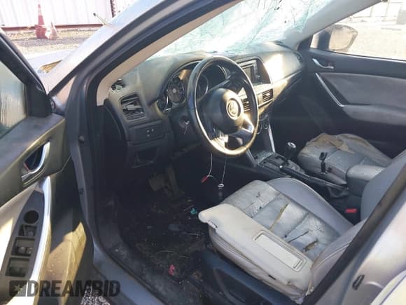 ✅ 2013 Mazda CX-5 Touring • VIN: JM3KE2CE1D0103888 • Lot: 43298744. Listed on IAAI with 305,966 mi. Free auction sales archive from the USA and detailed vehicle history report at DreamBid. Image 5.