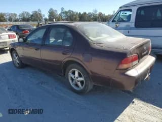 ✅ 1997 Nissan Maxima GXE • VIN: JN1CA21D3VT817964 • Lot: 77006234. Listed on Copart with 242,557 mi. Free auction sales archive from the USA and detailed vehicle history report at DreamBid. Image 2.