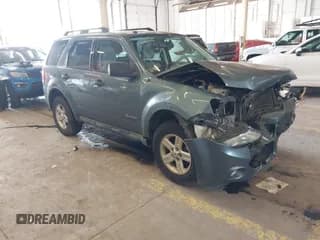 ✅ 2011 Ford Escape Hybrid • VIN: 1FMCU4K31BKC63987 • Lot: 41987374. Listed on IAAI with 111,568 mi. Free auction sales archive from the USA and detailed vehicle history report at DreamBid. Image 1.