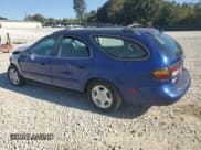 ✅ 1997 Ford Taurus GL • VIN: 1FALP57U2VA153212 • Lot: 75761034. Listed on Copart with 167,802 mi. Free auction sales archive from the USA and detailed vehicle history report at DreamBid. Image 2.