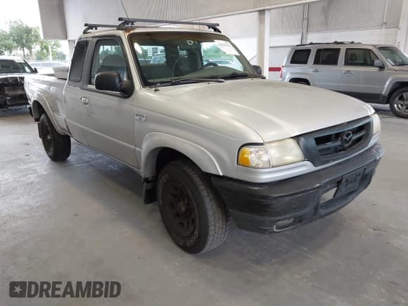 ✅ 2002 Mazda B-Series DS • VIN: 4F4YR16U22TM16164 • Lot: 42843218. Listed on IAAI with 141,043 mi. Free auction sales archive from the USA and detailed vehicle history report at DreamBid. Image 1.