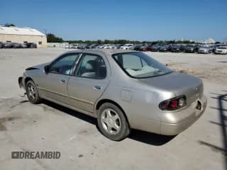 ✅ 1997 Nissan Altima XE • VIN: 1N4BU31D2VC268883 • Lot: 76528444. Listed on Copart with 138,146 mi. Free auction sales archive from the USA and detailed vehicle history report at DreamBid. Image 2.