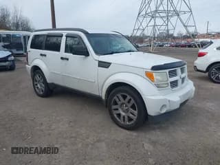 ✅ 2011 Dodge Nitro Heat • VIN: 1D4PU4GK2BW604735 • Lot: 43887161. Listed on IAAI with 127,485 mi. Free auction sales archive from the USA and detailed vehicle history report at DreamBid. Image 1.