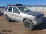 ✅ 2001 Jeep Grand Cherokee Limited • VIN: 1J4GW58N71C733859 • Лот: 82654035. Опубликован ранее на Copart с пробегом 197 193 миль. Бесплатный доступ к архиву аукционных продаж из США и подробный отчёт об истории автомобиля на DreamBid. Изображение 4.