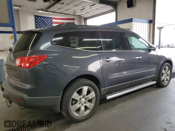 2012 Chevrolet Traverse LTZ с VIN 1GNKVLED0CJ351584, выставлен на аукционе Copart как лот 71313495 с пробегом 114 390 миль миль и Списание • Salvage title. История ставок и продаж доступна на DreamBid. Изображение 3.