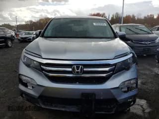 ✅ 2017 Honda Pilot EX-L • VIN: 5FNYF6H59HB008602 • Lot: 86858385. Listed on Copart with 155,467 mi. Free auction sales archive from the USA and detailed vehicle history report at DreamBid. Image 5.