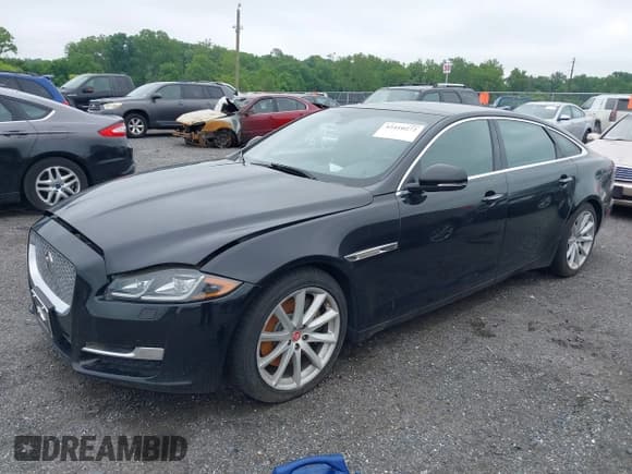 ✅ 2016 Jaguar XJ Portfolio • VIN: SAJWJ2GD0G8V97045 • Lot: 42410272. Listed on IAAI with 101,116 mi. Free auction sales archive from the USA and detailed vehicle history report at DreamBid. Image 2.