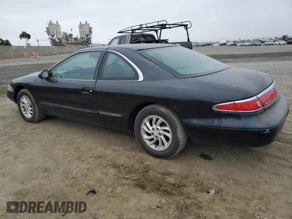 ✅ 1998 Lincoln Mark VIII • VIN: 1LNFM91V1WY700662 • Лот: 57137004. Опубликован ранее на Copart с пробегом 149 927 миль. Бесплатный доступ к архиву аукционных продаж из США и подробный отчёт об истории автомобиля на DreamBid. Изображение 2.