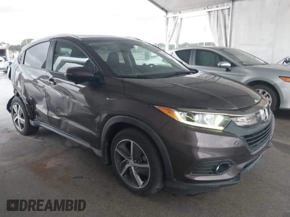✅ 2021 Honda HR-V EX-L • VIN: 3CZRU5H71MM704067 • Lot: 41986425. Listed on IAAI with 38,260 mi. Free auction sales archive from the USA and detailed vehicle history report at DreamBid. Image 1.