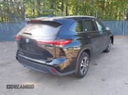 ✅ 2022 Toyota Highlander Hybrid XLE • VIN: 5TDGBRCH3NS561716 • Lot: 43162841. Listed on IAAI with 234,602 mi. Free auction sales archive from the USA and detailed vehicle history report at DreamBid. Image 4.