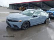 ✅ 2024 Honda Civic Sport Touring • VIN: 19XFL1G88RE011755 • Lot: 43459157. Listed on IAAI with 5,597 mi. Free auction sales archive from the USA and detailed vehicle history report at DreamBid. Image 2.