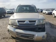 ✅ 2004 Mitsubishi Montero Limited • VIN: JA4MW51S44J004933 • Lot: 46561465. Listed on Copart with 213,714 mi. Free auction sales archive from the USA and detailed vehicle history report at DreamBid. Image 5.