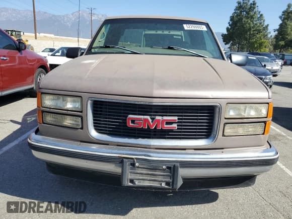 ✅ 1997 GMC Sierra 1500 • VIN: 2GTEC19MXV1553579 • Lot: 52266665. Wystawiony na Copart z przebiegiem 171 783 mil. Bezpłatny archiwum sprzedaży aukcyjnych z USA i szczegółowy raport historii pojazdu na DreamBid. Zdjęcie 5.