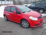 ✅ 2011 Suzuki SX4 Sportback • VIN: JS2YA5A51B6300935 • Lot: 41526960. Listed on IAAI with 152,624 mi. Free auction sales archive from the USA and detailed vehicle history report at DreamBid. Image 1.