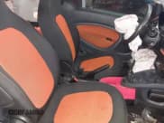 ✅ 2016 Smart fortwo Passion • VIN: WMEFJ5DA4GK045241 • Lot: 42553463. Wystawiony na IAAI z przebiegiem 66 775 mil. Bezpłatny archiwum sprzedaży aukcyjnych z USA i szczegółowy raport historii pojazdu na DreamBid. Zdjęcie 8.