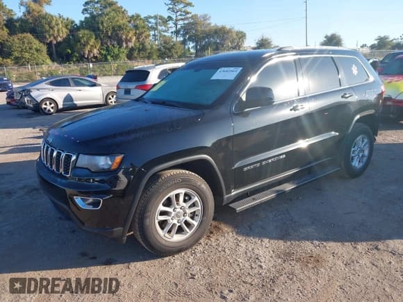 ✅ 2018 Jeep Grand Cherokee Laredo • VIN: 1C4RJEAG7JC269111 • Лот: 43682565. Опубликован ранее на IAAI с пробегом 104 253 миль. Бесплатный доступ к архиву аукционных продаж из США и подробный отчёт об истории автомобиля на DreamBid. Изображение 2.