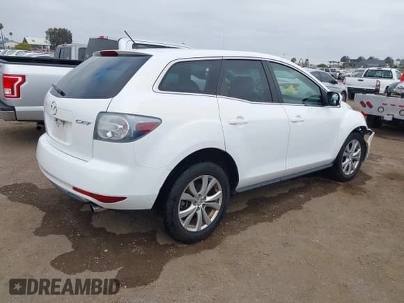✅ 2010 Mazda CX-7 Touring • VIN: JM3ER2WLXA0339558 • Lot: 42853958. Listed on IAAI with 106,842 mi. Free auction sales archive from the USA and detailed vehicle history report at DreamBid. Image 4.