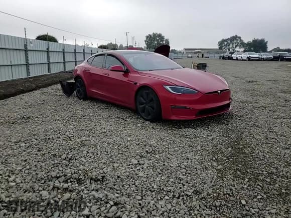 ✅ 2022 Tesla Model S • VIN: 5YJSA1E52NF475965 • Lot: 92209475. Listed on Copart with Not provided. Free auction sales archive from the USA and detailed vehicle history report at DreamBid. Image 13.