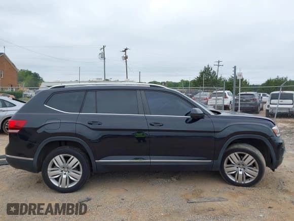 ✅ 2019 Volkswagen Atlas SEL • VIN: 1V2ER2CA1KC519716 • Lot: 43029509. Listed on IAAI with 79,854 mi. Free auction sales archive from the USA and detailed vehicle history report at DreamBid. Image 13.