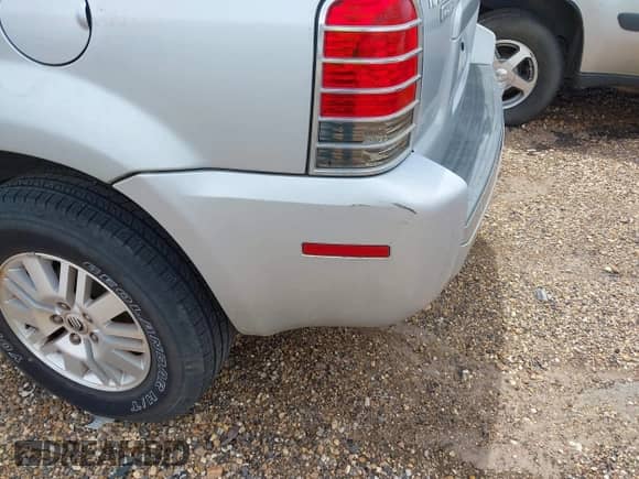 2005 Mercury Mariner Luxury с VIN 4M2YU56155DJ18530, выставлен на аукционе IAAI как лот 42307355 с пробегом 74 905 миль миль и . История ставок и продаж доступна на DreamBid. Изображение 13.