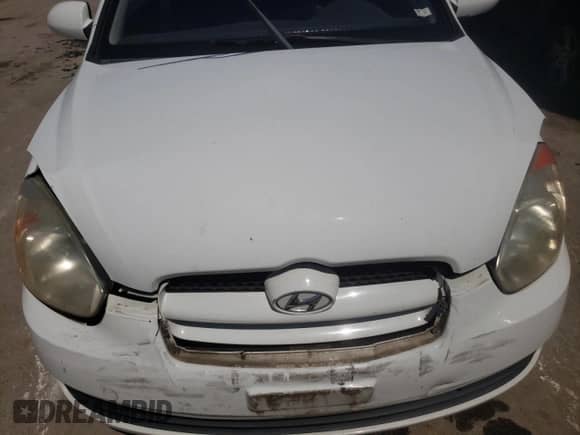 2007 Hyundai Accent GS with VIN KMHCM36C27U030166, listed as a Copart auction lot 67738154 with 174,856 mi miles and Salvage title. Bid and sale history available at DreamBid. Image 11.