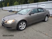 ✅ 2012 Chevrolet Malibu 1LS • VIN: 1G1ZB5E09CF150285 • Lot: 86843625. Listed on Copart with 129,115 mi. Free auction sales archive from the USA and detailed vehicle history report at DreamBid. Image 1.
