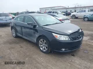 ✅ 2013 Buick LaCrosse Premium 2 • VIN: 1G4GH5G37DF128531 • Lot: 41754345. Wystawiony na IAAI z przebiegiem 129 837 mil. Bezpłatny archiwum sprzedaży aukcyjnych z USA i szczegółowy raport historii pojazdu na DreamBid. Zdjęcie 1.