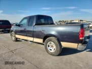 ✅ 1999 Ford F-150 • VIN: 1FTRX17W4XNB72337 • Lot: 86766575. Listed on Copart with 183,712 mi. Free auction sales archive from the USA and detailed vehicle history report at DreamBid. Image 2.