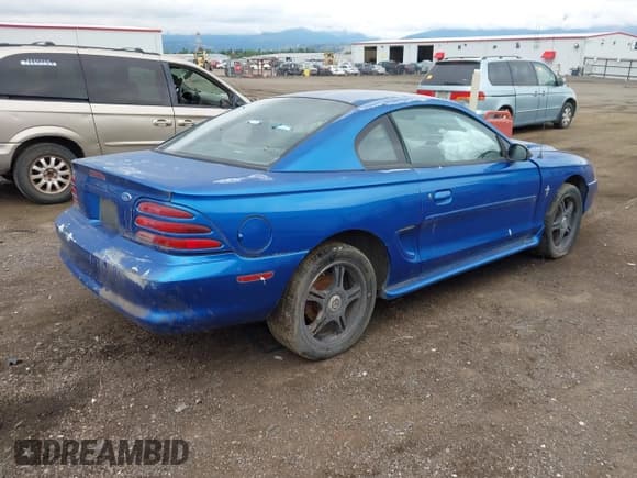 ✅ 1995 Ford Mustang • VIN: 1FALP4046SF207937 • Lot: 42222338. Listed on IAAI with 228,850 mi. Free auction sales archive from the USA and detailed vehicle history report at DreamBid. Image 4.