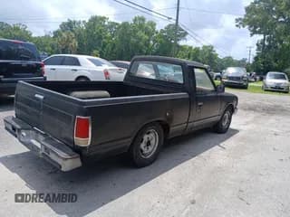 ✅ 1985 Nissan 720 • VIN: 1N6ND01S1FC318854 • Лот: 61226215. Опубликован ранее на Copart с пробегом 164 219 миль. Бесплатный доступ к архиву аукционных продаж из США и подробный отчёт об истории автомобиля на DreamBid. Изображение 4.