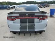 ✅ 2020 Dodge Charger SRT Hellcat • VIN: 2C3CDXL90LH227942 • Lot: 84583175. Listed on Copart with 42,698 mi. Free auction sales archive from the USA and detailed vehicle history report at DreamBid. Image 6.