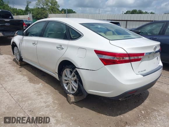 ✅ 2013 Toyota Avalon XLE • VIN: 4T1BK1EB2DU054509 • Lot: 42459191. Listed on IAAI with 173,008 mi. Free auction sales archive from the USA and detailed vehicle history report at DreamBid. Image 3.