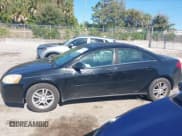 ✅ 2005 Pontiac G6 • VIN: 1G2ZG528154135608 • Lot: 43689578. Listed on IAAI with 191,748 mi. Free auction sales archive from the USA and detailed vehicle history report at DreamBid. Image 14.